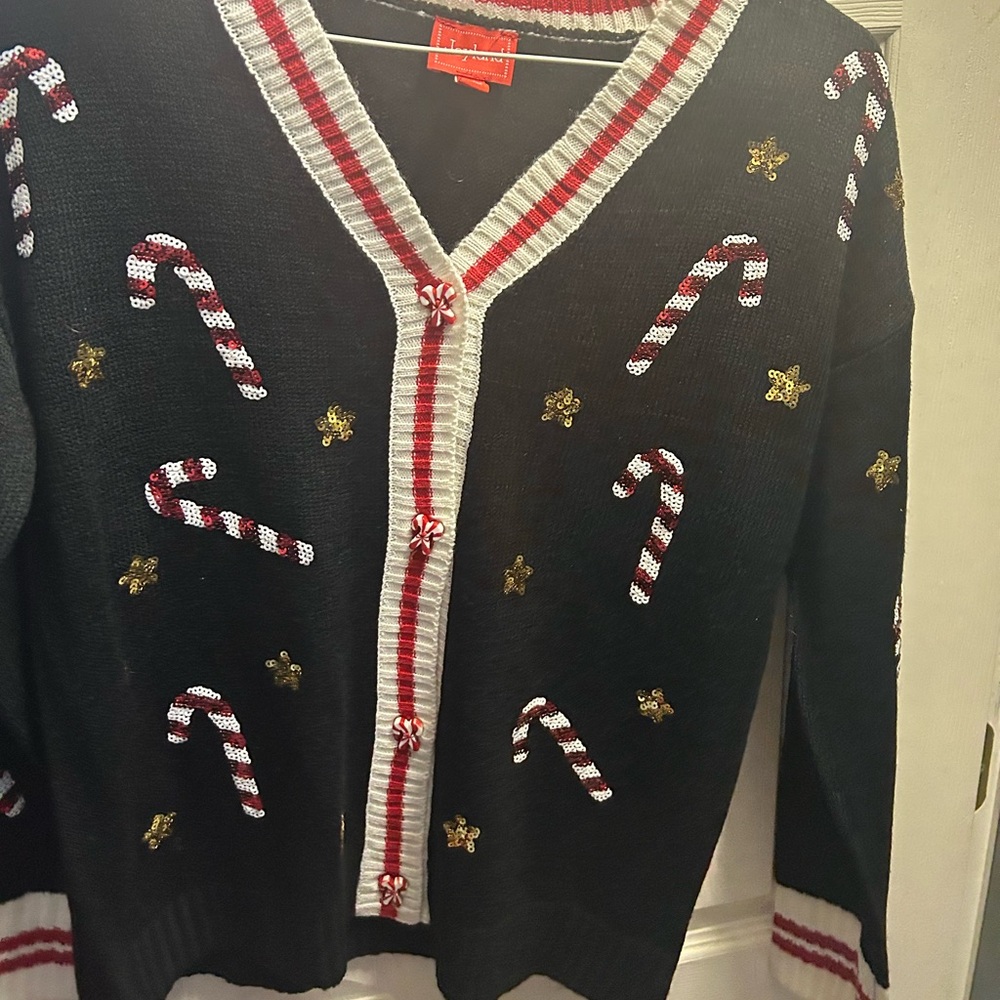 NWOT CHRISTMAS candy cane cardigan sweater.